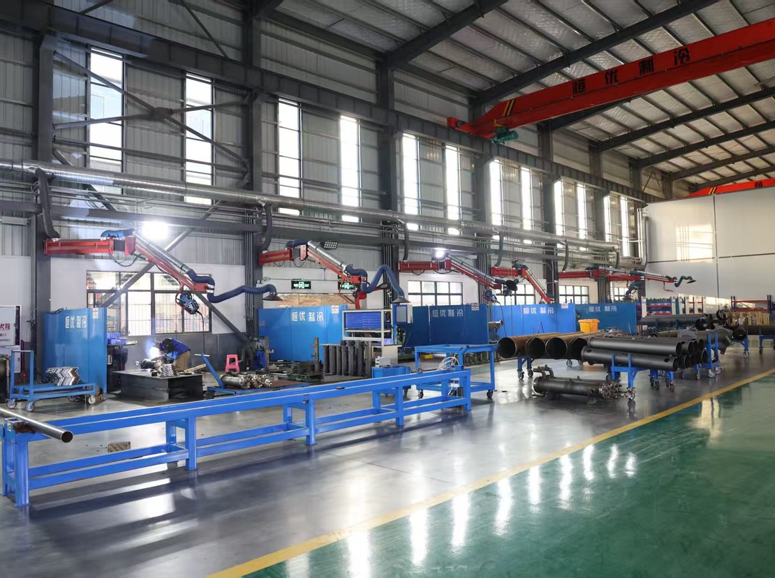 Automatic welding stations in a row under the overhead crane